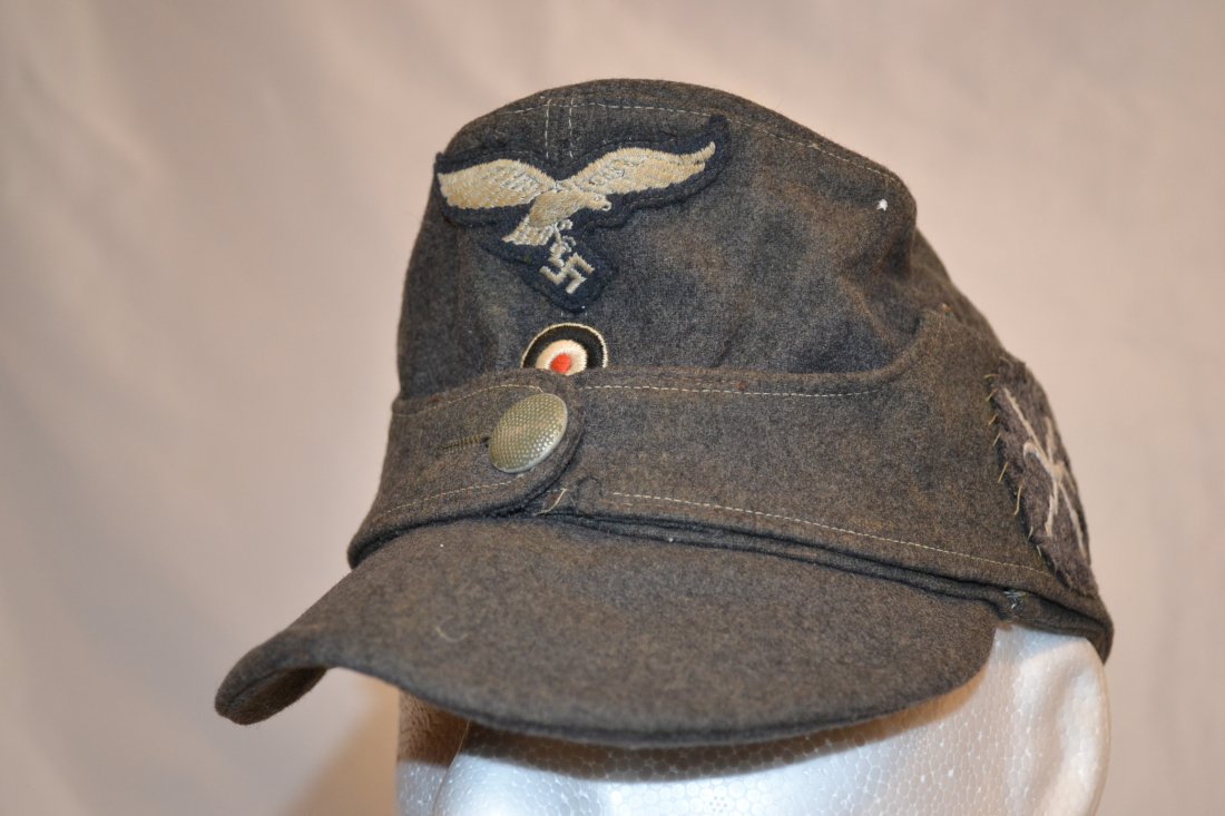 WWII GERMAN RARE LUFTWAFFE FEMALE HELPER M43 HAT: WWII GERMAN LUFTWAFFE FEMALE HELPER M43 HAT . VERY RARE HAT . THE BOTTOM ON THE OPPOSITE FLAP FOR FEMALES. TECHNICAL PATCH TO THE SIDE. GREAT OVERALL CONDITION. SOME MOTH NIPS ON THE SIDE PATCH. SIZE 