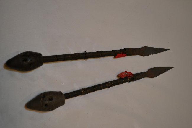 ANTIQUE PAIR OF MIDDLE EASTERN DART STYLE EDGED WEAPONS: ANTIQUE PAIR OF MIDDLE EASTERN DART STYLE EDGED WEAPONS . THROWING WEAPONS. DISPLAYS GREAT AGE. HAND FORGES METAL SPEAR ENDS. VERY UNIQUE WEAPONS . 14" LONG .