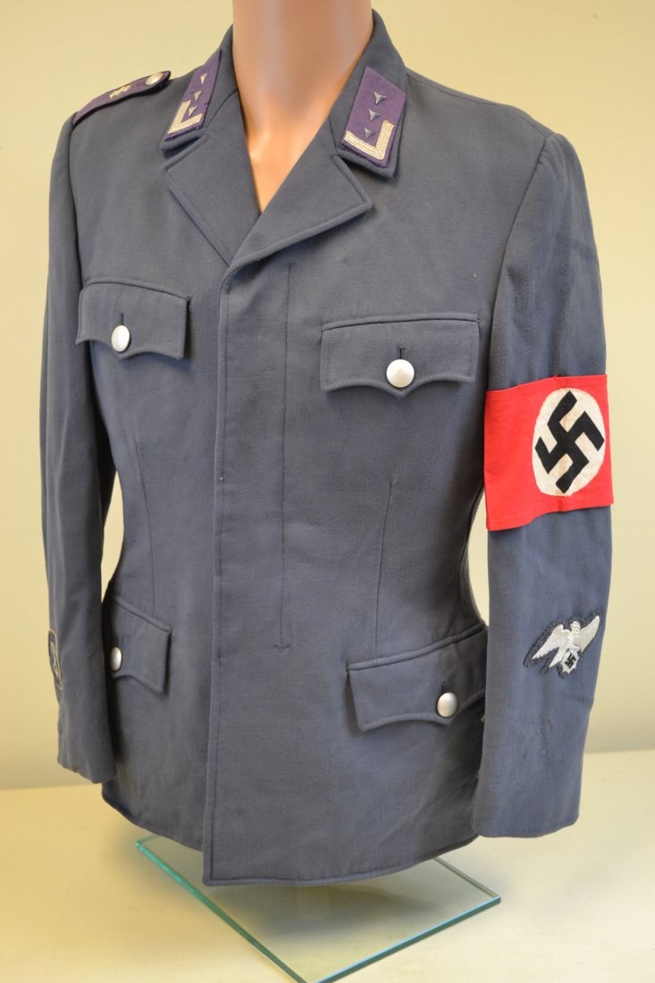 WWII GERMAN RLB MEDIC UNIFORM TUNIC - RARE: WWII GERMAN RLB MEDIC UNIFORM TUNIC . NICE CONDITION COMPLETE WITH ALL INSIGNIA. SOME MOTH DAMAGE TO A COLLAR TAB . MEDICAL INSIGNIA ON THE SHOULDER BOARD . SMALL SIZE . VERY RARE .