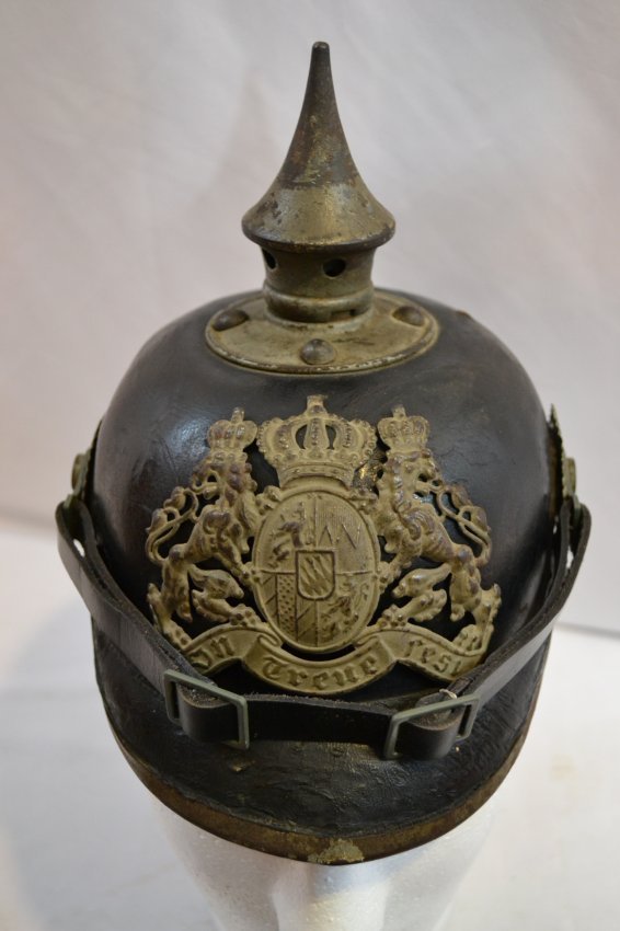 WWI IMPERIAL GERMAN BAVARIAN PICKELHAUBE SPIKE HELMET: WWI IMPERIAL GERMAN BAVARIAN PICKELHAUBE SPIKE HELMET . GRAY WARTIME FITTINGS . M1915 . DATED 1916 . ORIGINAL LINER . REPLACED CHIN STRAP . ORIGINAL COCKADES. GREAT CONDITION FOR ITS AGE.