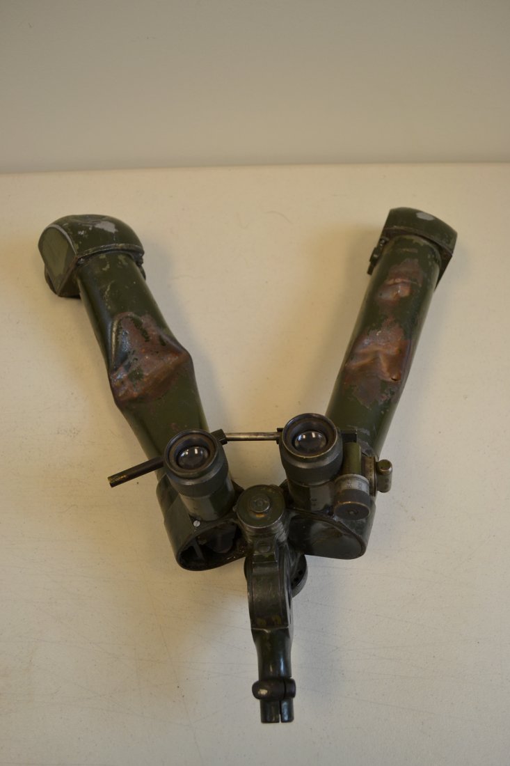 WWII GERMAN MILITARY TRENCH RABBIT EARS BINOCULARS: WWII GERMAN MILITARY TRENCH RABBIT EARS BINOCULARS . BATTLEFIELD DAMAGED . NICE WAR SOUVENIR . OPTICS IS DAMAGED . ORIGINAL FIELD GREEN PAINTED. VERY HEAVY .