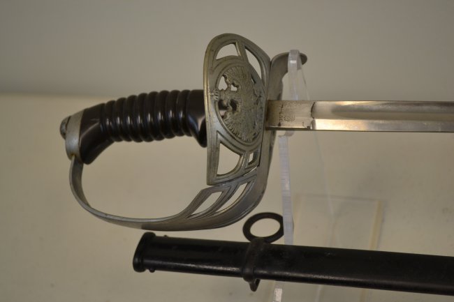 IMPERIAL GERMAN PRUSSIAN CAVALRY OFFICER'S M-89 SWORD: IMPERIAL GERMAN PRUSSIAN CAVALRY OFFICER\\\'S M-89 SWORD . VERY NICE AND CLEAN CONDITION. BRIGHT BLADE WITH NO ISSUES .W.K.&C. SOLINGEN. 40\\\" LONG WITH 34\\\" LONG BLADE.