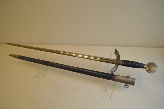 WWII GERMAN LUFTWAFFE OFFICER DRESS SWORD SMF SOLINGEN: WWII GERMAN LUFTWAFFE OFFICER'S DRESS SWORD . SMF SOLINGEN MADE. EARLY HIGH QUALITY NICKEL SILVER FITTINGS. BLUE LEATHER GRIP AND SCABBARD WITH SOME WEAR . BRIGHT RUST FREE BLADE WITH SOME SMALL NICKS