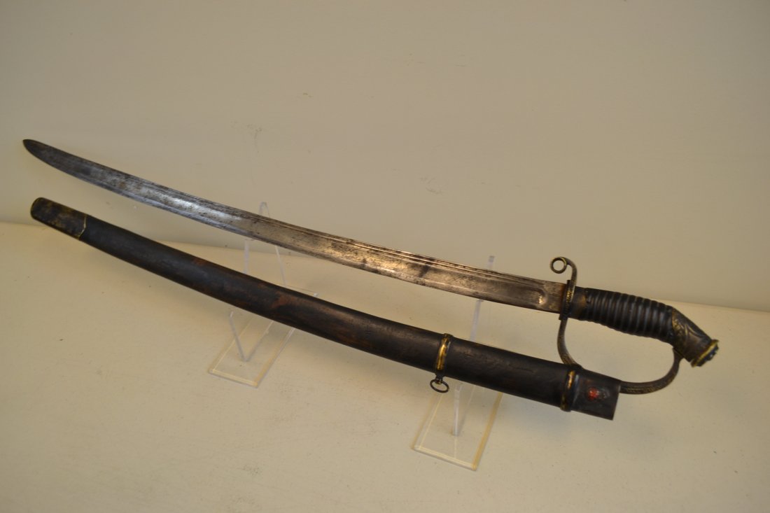 IMPERIAL RUSSIAN DRAGOON OFFICERS M1909 SWORD St. ANNA: IMPERIAL RUSSIAN DRAGOON OFFICER'S M1909 SWORD . St. ANNA AWARD .DISPLAYS A GREAT AGE WITH MUCH WEAR TO THE BLADE AND DARK PATINA ON BRASS FITTINGS. THE BLADE IS OLD AND ETCHED WITH IMPERIAL RUSSIAN C
