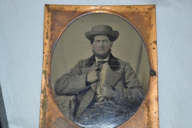 CIVIL WAR ERA RUBY AMBROTYPE MAN'S PICTURE 1/16TH PLATE: CIVIL WAR ERA RUBY AMBROTYPE MAN'S PICTURE 1/16TH PLATE . LOOKS LIKE WEARING CONFEDERATE TYPE CLOTHING AND A GUN BELT.