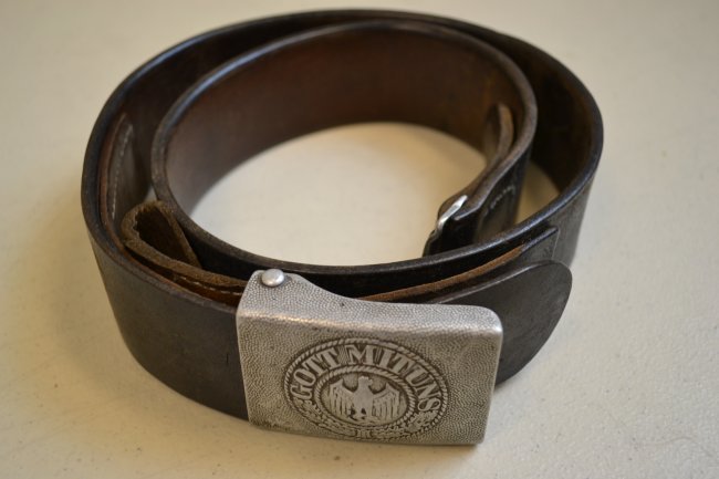 WWII GERMAN ARMY ENLISTED LEATHER BELT BUCKLE RUSSIAN: WWII GERMAN ARMY ENLISTED LEATHER BELT AND BUCKLE . VERY NICE COMPLETE BELT WITH ALUMINUM BUCKLE . LOOKS LIKE WAS WORN OR CAPTURED BY A RUSSIAN PERSON . HAS RUSSIAN NAME WRITTEN INSIDE "YARTSEV" IN RU