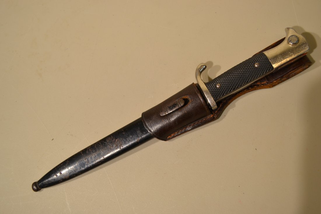 WWII GERMAN SHORT DRESS BAYONET WKC: WWII GERMAN SHORT DRESS BAYONET . COMPLETE WITH SCABBARD AND LEATHER FROG. WKC STAMPED .