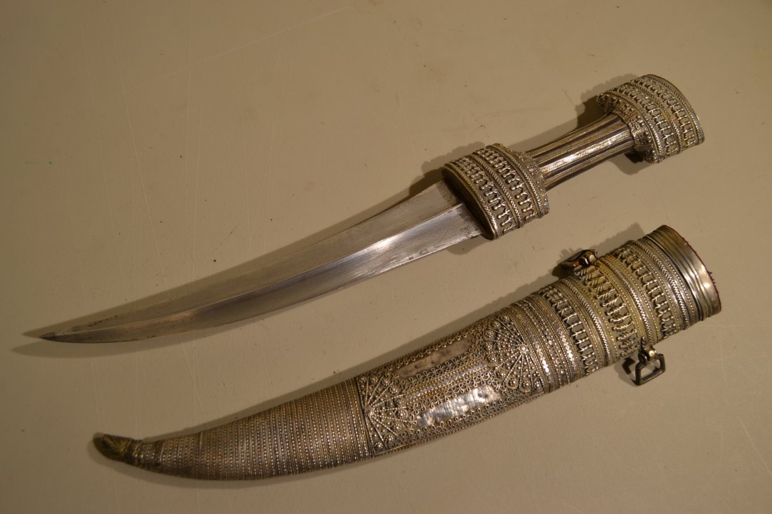 ANTIQUE ISLAMIC IRANIAN BEBUT SILVER DECORATED DAGGER: ANTIQUE ISLAMIC IRANIAN BEBUT SILVER DECORATED DAGGER . BEAUTIFUL PIECE . 2nd HALF OF 19th CENTURY . THIS BEBUT WAS BROUGHT BACK BY US MARINE FROM IRAQ AFTER A GULF WAR .21.5" LONG WITH 10.5" LONG BLA
