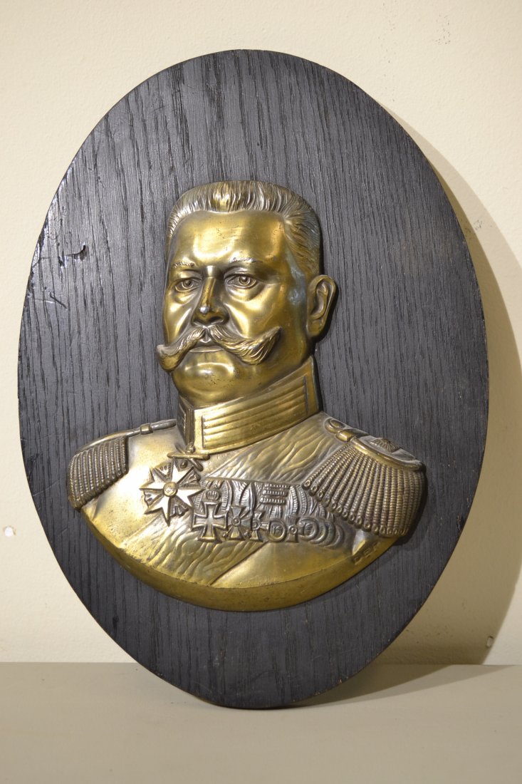 IMPERIAL GERMAN PAUL VON HINDENBURG BRASS PLAQUE: IMPERIAL GERMAN PAUL VON HINDENBURG BRASS PLAQUE . MOUNTED ON A WOOD BASE WALL HANGER. HIGH QUALITY . Paul Ludwig Hans Anton von Beneckendorff und von Hindenburg, typically known simply as Paul von Hi