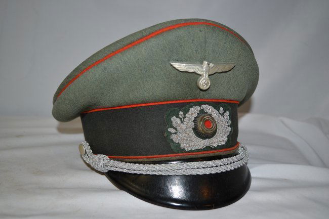 WWII GERMAN ARTILLERY OFFICER VISOR CAP HAT EREL: WWII GERMAN ARTILLERY OFFICER VISOR CAP HAT. HIGH QUALITY MADE BY EREL . NICE WORN EXAMPLE BUT STILL IN GREAT SHAPE EXAMPLE . SIZE ABOUT 58 . VERY NICE HAT !