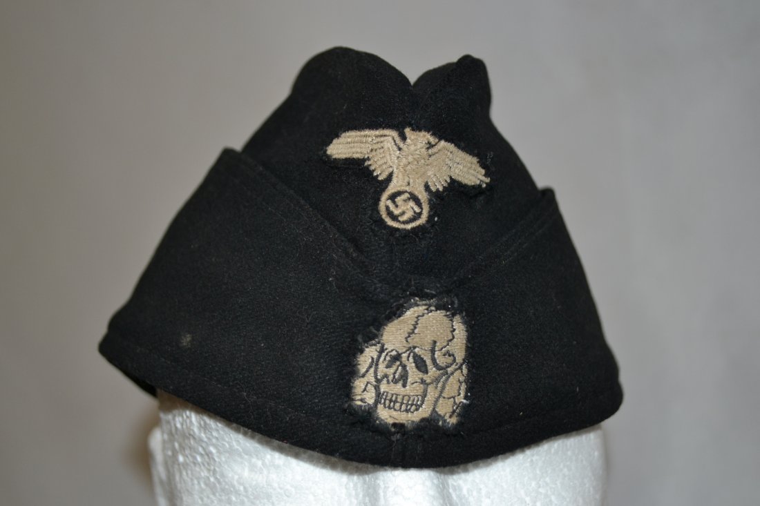 WWII NAZI SS PANZER BLACK WOOL OVERSEAS HAT CAP RZM TAG: WWII NAZI SS PANZER BLACK WOOL OVERSEAS HAT CAP . NICE WELL WORN EXAMPLE. CORRECT SS CUT STYLE CAP . HAND APPLIED SS INSIGNIA. RZM TAG INSIDE WELL WORN . LARGE SIZE ABOUT 59 . VERY RARE !