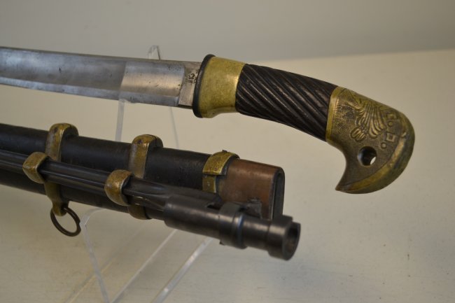 SOVIET RUSSIAN COSSACK SWORD 1937 DATED WITH BAYONET: SOVIET RUSSIAN COSSACK SWORD 1937 DATED WITH BAYONET . VERY GOOD CONDITION SWORD COMPLETE WITH SCABBARD . NICOLAS II CREST ON THE POMMEL . ZIK 37 MARKED ON THE BLADE . ALL BRASS FITTINGS HAVE MATCHING