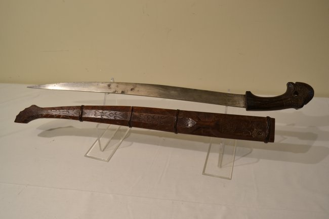 PHILIPPINES ANTIQUE VISAYAN SWORD: PHILIPPINES ANTIQUE VISAYAN SWORD. LARGE SIZE 29" LONG WITH 23" BLADE . CARVED WOOD SCABBARD AND GRIP.