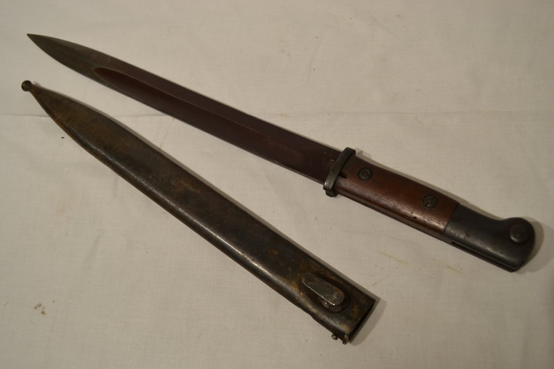 WWI IMPERIAL GERMAN S14 B.K. MAUSER BAYONET VERY RARE: VERY NICE NEAR MINT CONDITION RARE WWI GERMAN S14 MAUSER BAYONET WITH SCABBARD . THE BLADE STILL HAS NICE RED FINISH AND STAMPED B.K. FOR BEKA RECORDS GERMAN COMPANY THAT WAS MAKING BAYONETS FOR THE A