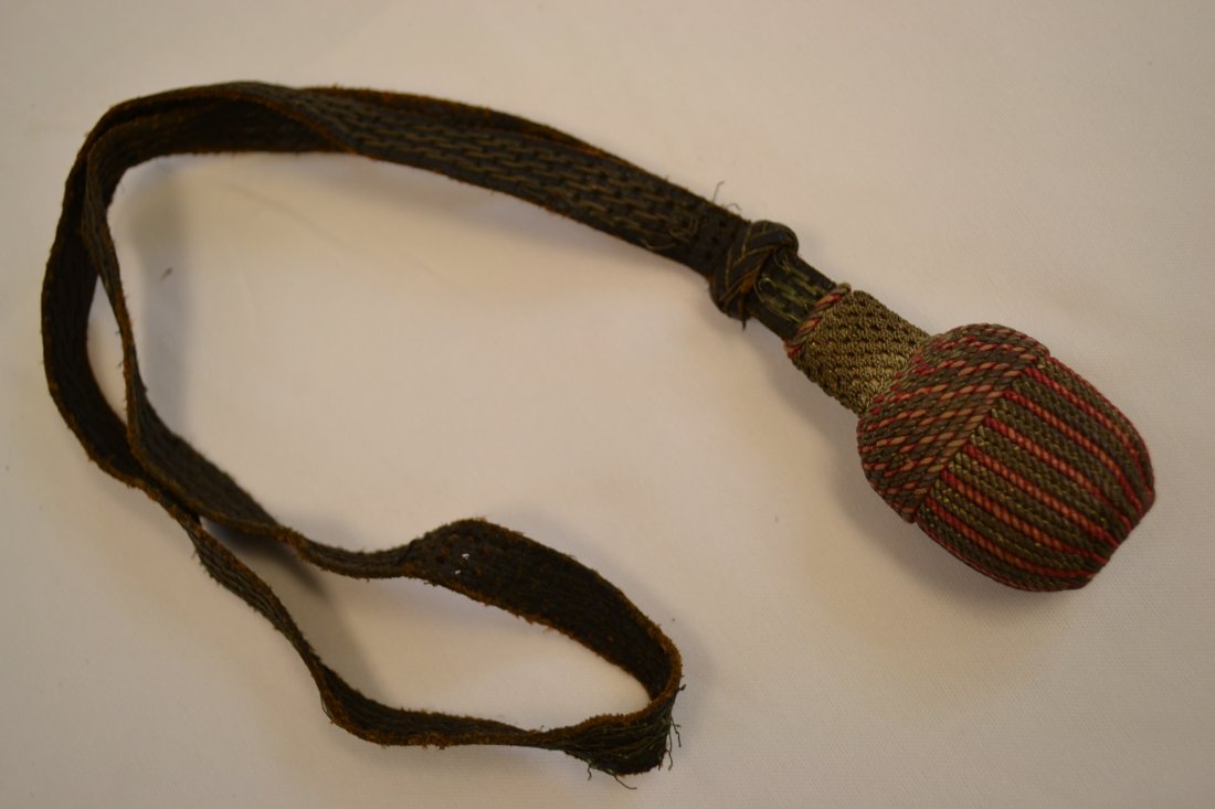 WWII GERMAN LEATHER SWORD / BAYONET KNOT: WWII GERMAN LEATHER SWORD / BAYONET KNOT . WELL USED CONDITION. SOME REPAIRS TO A STRAP