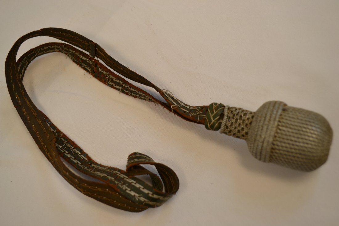 WWII GERMAN LEATHER SWORD / BAYONET KNOT: WWII GERMAN LEATHER SWORD / BAYONET KNOT . WELL USED BUT STILL GOOD CONDITION. SOME REPAIRS TO A LEATHER STRAP