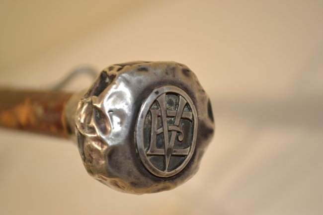ANTIQUE WALKING CANE SILVER HEAD SPIKED WEAPON INSIDE: ANTIQUE WALKING CANE SILVER HEAD SPIKED WEAPON INSIDE . VERY NICE AND UNIQUE DESIGN. SILVER HEAD WITH MONOGRAM OF THE OWNER. SPIKE CAN BE EXPOSED BY UNSCREWING THE TOP . LATE 19TH -EARLY 20TH CENTURY.
