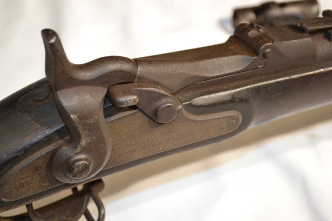 RARE US MILITARY M 1870 SPRINGFIELD TRAPDOOR RIFLE: A Scarce Antique U.S. Military Model 1870 Trapdoor SPRINGFIELD Rifle. Left over Civil War lock dated "1863", and marked "U.S. SPRINGFIELD" ahead of the Federal Eagle. The breech-block marked "Model 18