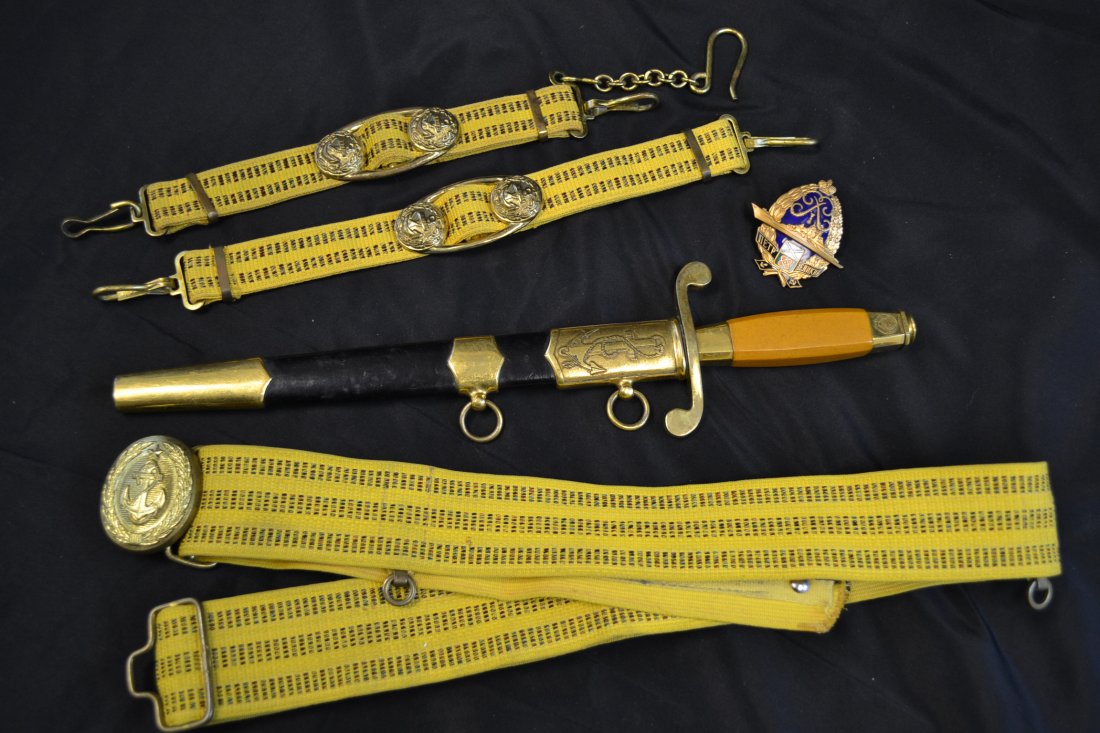SOVIET RUSSIAN NAVY OFFICERS DRESS DAGGER 1955 W BELT: SOVIET RUSSIAN NAVY OFFICERS DRESS DAGGER 1955 . COMPLETE WITH BELT AND RUSSIAN NAVY BADGE - BATTLECRUISER PYOTR VELIKIY.GREAT CONDITION WITH MINTY BLADE DATED 1955.