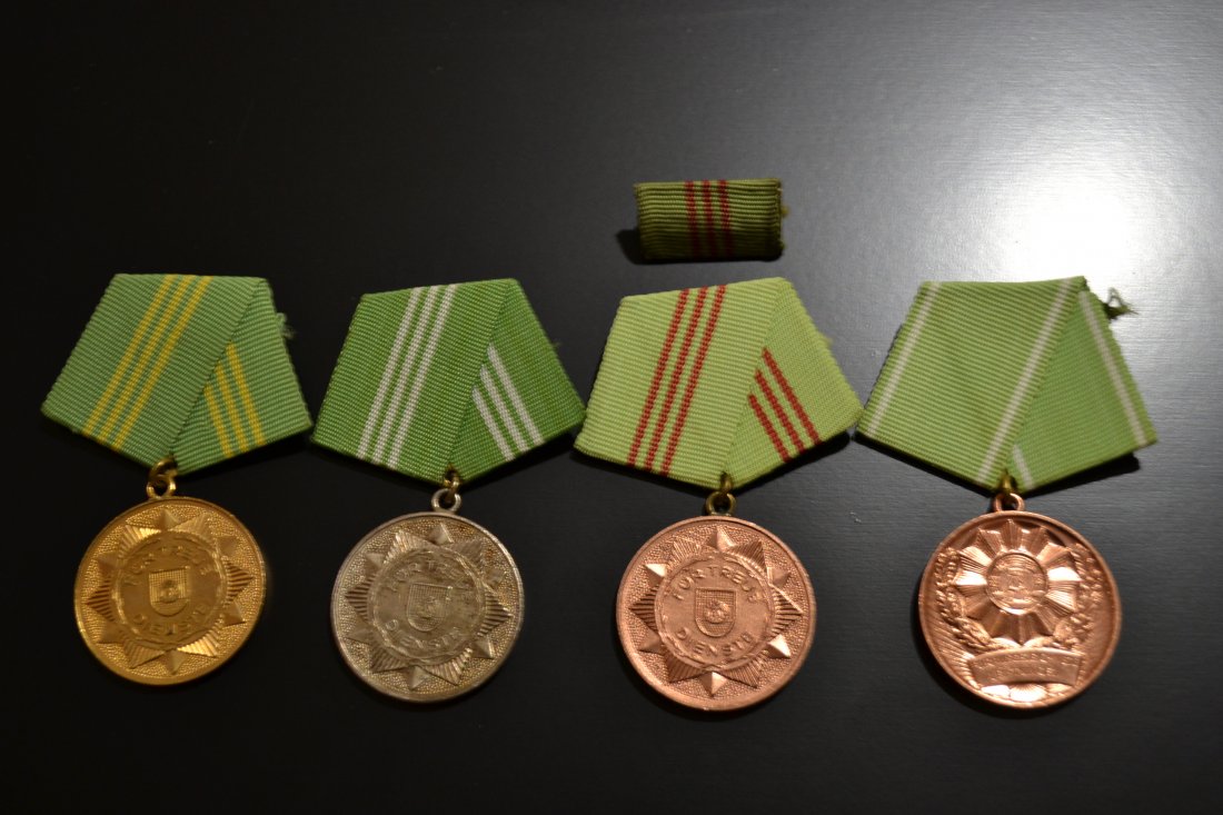 EAST GERMAN DDR MEDALS SET OF 4: EAST GERMAN DDR MEDALS SET OF 4