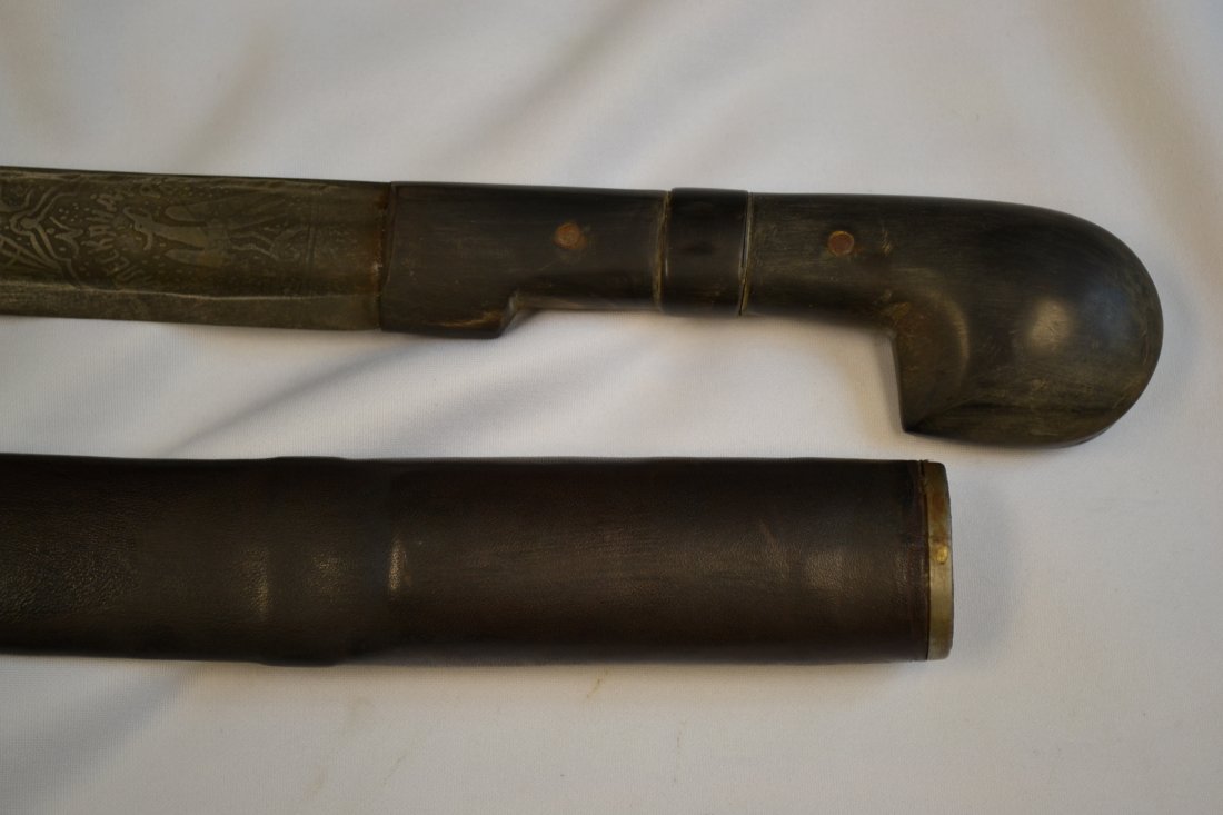 RUSSIAN CAUCASIAN SHASHKA SWORD WITH ETCHED BLADE: RUSSIAN CAUCASIAN SHASHKA SWORD. RESTORED PIECE. LARGE SIZE. 37." LONG WITH 30.5" BLADE . NEWLY MADE SCABBARD. ETCHED BLADE. NO WAY TO TELL HOW OLD IS THE ETCHING BUT LOOKS NICE WITH NAME "ALEKSANDRO"