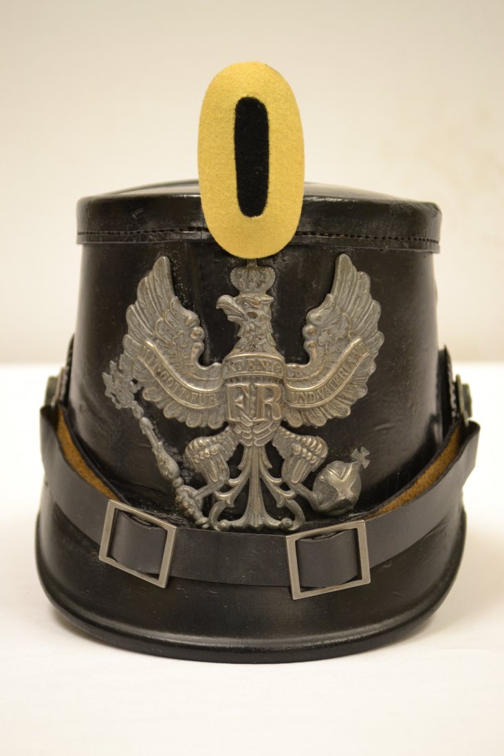 IMPERIAL GERMAN WWI JAGER TROOPS SHAKO HELMET PRUSSIA: IMPERIAL GERMAN WWI JAGER TROOPS SHAKO HELMET . PRUSSIA . WARTIME GRAY FITTINGS. VERY NICE AND CLEAN CONDITION . NEAR MINT OUTSIDE. INSIDE SHOWS ITS AGE WITH LINER LEATHER GONE. GREAT EXAMPLE TO DISPL