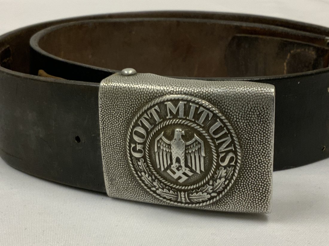WWII GERMAN ARMY LEATHER BELT WITH ALUMINUM BUCKLE: WWII GERMAN ARMY LEATHER BELT WITH BUCKLE . ALUMINUM BUCKLE AND CATCH . 1938 DATE ON THE BELT AND LEATHER BUCKLE TAB , GREAT CONDITION .