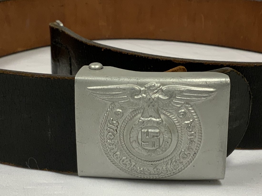 WWII GERMAN SS EM/NCO BELT & BUCKLE RZM 36/39 SS: WWII GERMAN SS EM/NCO BELT & BUCKLE RZM 36/39 SS . VERY NICE NEAR MINT CONDITION SET . BUCKLE IS MARKED RZM 36/39 SS MADE BY "Overhoff and Cie of Ludenscheid" IN 1939 . BLACK LEATHER BELT IN GREAT CON
