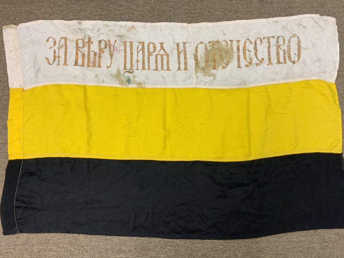 RUSSIAN IMPERIAL MONARCHY CIVILIAN FLAG: RUSSIAN IMPERIAL MONARCHY CIVILIAN FLAG . "FOR THE RELIGION , TZAR AND MOTHERLAND" . WELL WORN CONDITION WITH SOME REPAIRS AND DIRT . RARE FIND. 50" X 33"
