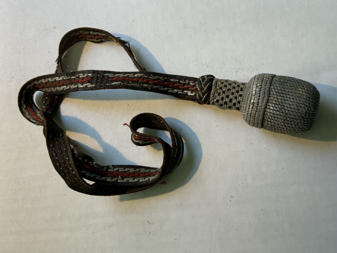 WWII GERMAN LEATHER SWORD / BAYONET POLICE KNOT: WWII GERMAN LEATHER SWORD / BAYONET POLICE KNOT . WELL USED CONDITION. WEAR TO THE STRAP BUT NO TEARS.