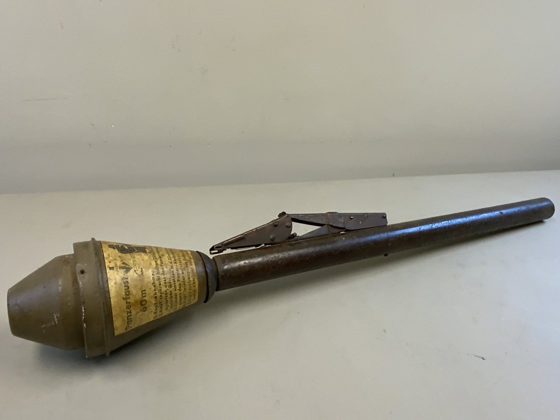 WWII GERMAN INERT Panzerfaust 60 ANTI-TANK ROCKET: WWII GERMAN INERT Panzerfaust 60 ANTI-TANK ROCKET LAUNCHER. ORIGINAL METAL LAUNCHER TUBE WITH TRIGGER MECHANISM AND ORIGINAL DEACTIVATED ROCKET HEAD. STAMPED AND DATED 1944 . SOME RUST AND CORROSION O