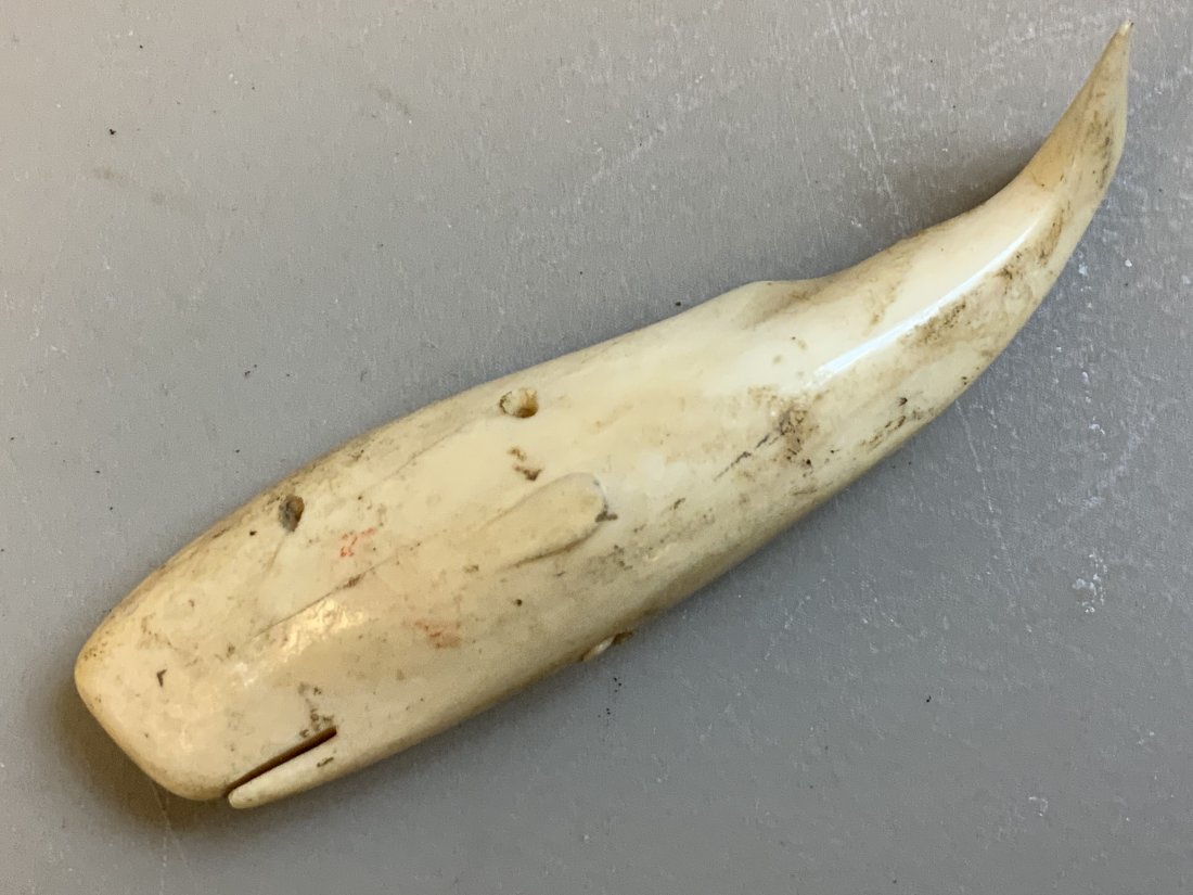 ANTIQUE RUSSIAN CARVED WHALE BONE FIGURE OF SPERM WHALE: ANTIQUE RUSSIAN CARVED WHALE BONE FIGURE OF SPERM WHALE . 3 1/2 " long .