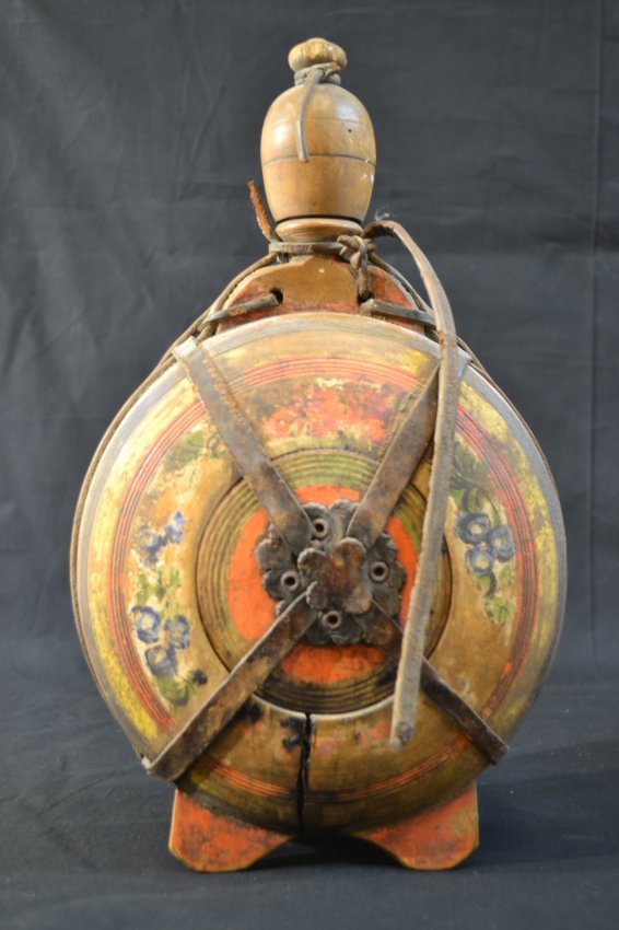ANTIQUE UKRAINIAN WOODEN VESSEL HANDPAINTED: ANTIQUE UKRAINIAN WOODEN VESSEL HAND PAINTED . WESTERN UKRAINE 19TH CENTURY. HAND PAINTED TRADITIONAL DESIGNS WITH LEATHER STRAP , COMPLETE WITH WOOD CAP . VERY NICE AND RARE FIND. 13" TALL