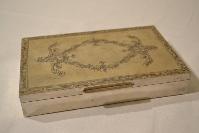 ANTIQUE SILVER PLATE COVERED CIGAR BOX 800 SILVER: ANTIQUE SILVER PLATE COVERED CIGAR BOX . WWII ERA GERMAN MADE . 800 SILVER HALLMARKS. 7 " X 4 1/4 " X 1 1/4"