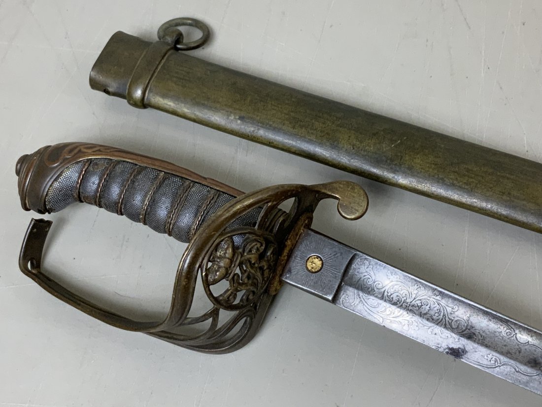 ANTIQUE BRITISH 1822 PATTERN OFFICERS SWORD: ANTIQUE BRITISH 1822 PATTERN OFFICERS SWORD . THIS ONE REALLY SHOWS ITS AGE . TIP OF THE BLADE BROKEN OFF. DENTS AND CRACK IN THE SCABBARD . DAMAGE TO THE CROSGUARD. STILL PIECE OF HISTORY !38" LONG W