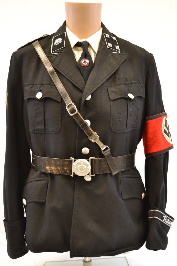 NAZI GERMAN ALLGEMEINE SS OFFICER UNIFORM TUNIC: NAZI GERMAN ALLGEMEINE SS OFFICER UNIFORM TUNIC . RUSSIAN MOVIE STUDIO USED. PUT TOGETHER FROM ORIGINAL AND REPRODUCTION PARTS. NICE WORN CONDITION . MOSCOW MOVIE STUDIO INK STAMPS INSIDE. SMALL - MED