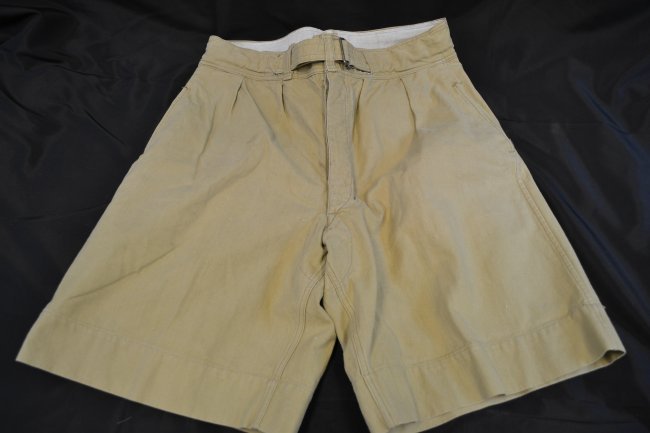 WWII GERMAN DAK AFRIKA KORPS TROPICAL UNIFORM SHORTS: WWII GERMAN DAK AFRIKA KORPS TROPICAL UNIFORM SHORTS . VERY NICE AND CLEAN USED CONDITION. INK STAMPED INSIDE.