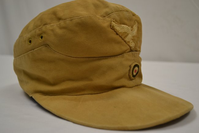 WWII GERMAN M41 LUFTWAFFE TROPICAL AFRIKA KORPS CAP HAT: WWII GERMAN M41 LUFTWAFFE TROPICAL AFRIKA KORPS CAP HAT . LIGHT WEIGHT LUFTWAFFE M41 EXAMPLE. WELL WORN WITH SWEAT STAINED AND WEATHERED . SIZE ABOUT 56