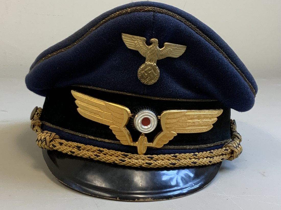 WWII GERMAN REICHSBAHN RAILWAY GENERAL DIREKTOR HAT: WWII GERMAN REICHSBAHN RAILWAY GENERAL DIREKTOR HAT . VERY RARE HAT FOR HIGH RANKING OFFICIAL . Generaldirektor der DR .GOLD PIPING . GOLD TONE FINISHED INSIGNIA . WELL WORN BUT STILL IN GREAT CONDITI