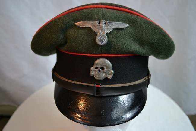 WWII GERMAN WAFFEN SS PANZER NCO OFFICER VISOR HAT CAP: WWII GERMAN SS PANZER NCO OFFICER'S VISOR HAT . WELL WORN WITH SOME TEARS REPAIRED . PINK PIPING . NICE SADDLE SHAPE . RARE !!