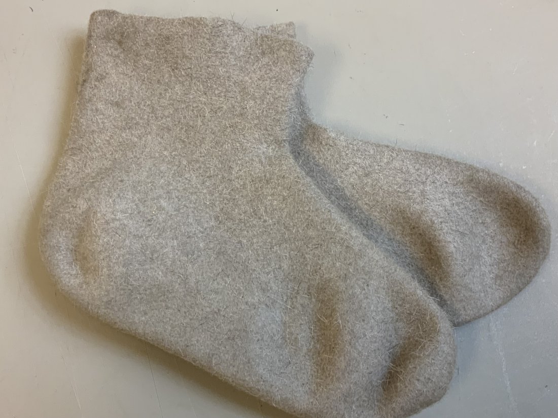WWII GERMAN RUSSIAN FRONT RUSSIAN MADE VALENKI FOOT: WWII GERMAN RUSSIAN FRONT RUSSIAN MADE VALENKI FOOT WARMERS . FELT BOOTS . GERMAN ISSUE STAMPING INSIDE . UNUSED . STILL ATTACHED . RARE FIND.