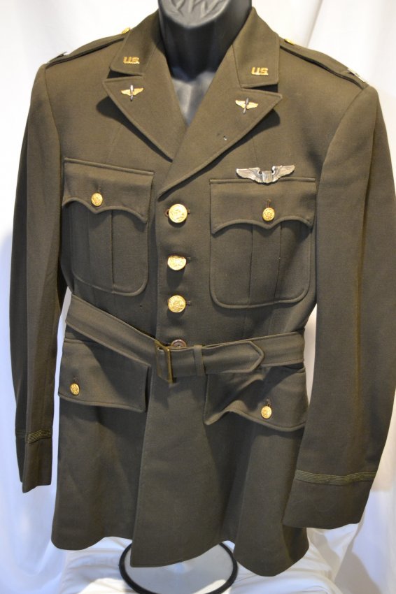 WWII US AIR FORCE FLIGHT CAPTAIN OFFICER JACKET UNIFORM: WWII US AIR FORCE FLIGHT CAPTAIN OFFICER JACKET UNIFORM . NAMED ON THE LABEL INSIDE . DATED 1942 . SIZE 38 REG. SILVER FLIGHT WINGS. GREAT CONDITION OVERALL .