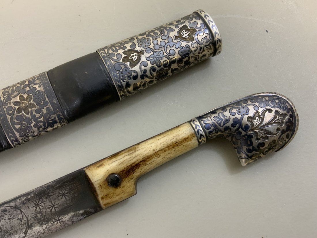 BEAUTIFUL SILVER NIELLO SMALL SHASHKA SWORD CAUCASIAN: BEAUTIFUL SILVER NIELLO SMALL SHASHKA SWORD CAUCASIAN . VERY HIGH QUALITY ANTIQUE CAUCASIAN SMALL SWORD FOR A CHILD. VERY OLD BLADE WITH MANY ENGRAVINGS. COMES WITH RARE CHILD SIZE PERIOD BELT.VERY RA