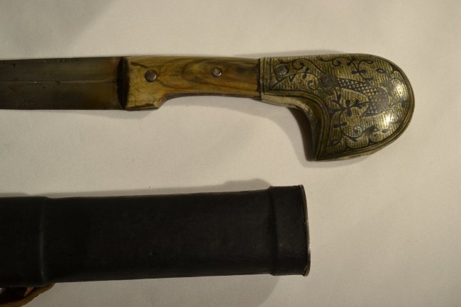 ANTIQUE RUSSIAN CAUCASIAN SILVER SHASHKA SWORD & BELT: IMPERIAL RUSSIAN CAUCASIAN SILVER DECORATED SHASHKA SWORD . ANTIQUE BLADE WITH "GURDA" CHARACTERISTIC MAKERS MARK . RESTORED SCABBARD WITH NEW LEATHER. COMES WITH CARRY BELT WITH OLD FITTINGS. 38" LON