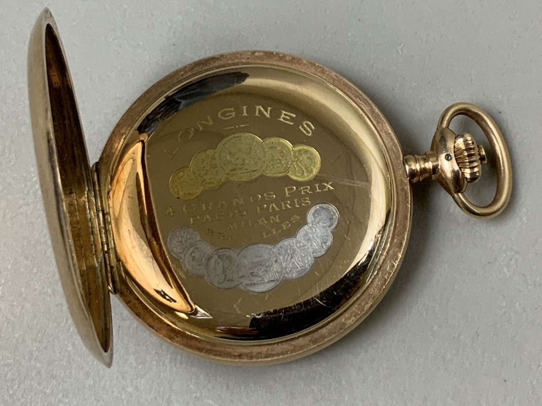 ANTIQUE LONGINES 14K 56 GOLD POCKET WATCH WORKING: ANTIQUE LONGINES 14K 56 GOLD POCKET WATCH . # 2419988 MATCHING ON ALL COVERS AND MECHANISM. WORKS PERFECT. 2" DIAMETER. TOTAL WEIGHT IS 114.2GR. 61 GR SOLID 14K GOLD . THIS MODEL HAS NO GLASS ON TOP O