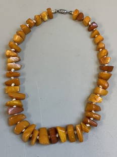 ANTIQUE RUSSIAN NATURAL BALTIC AMBER NECKLACE: ANTIQUE RUSSIAN NATURAL BALTIC AMBER NECKLACE . SILVER CHAIN WITH LOCK . NATURAL CUT BALTIC AMBER. BEAUTIFUL PIECE.Condition Report