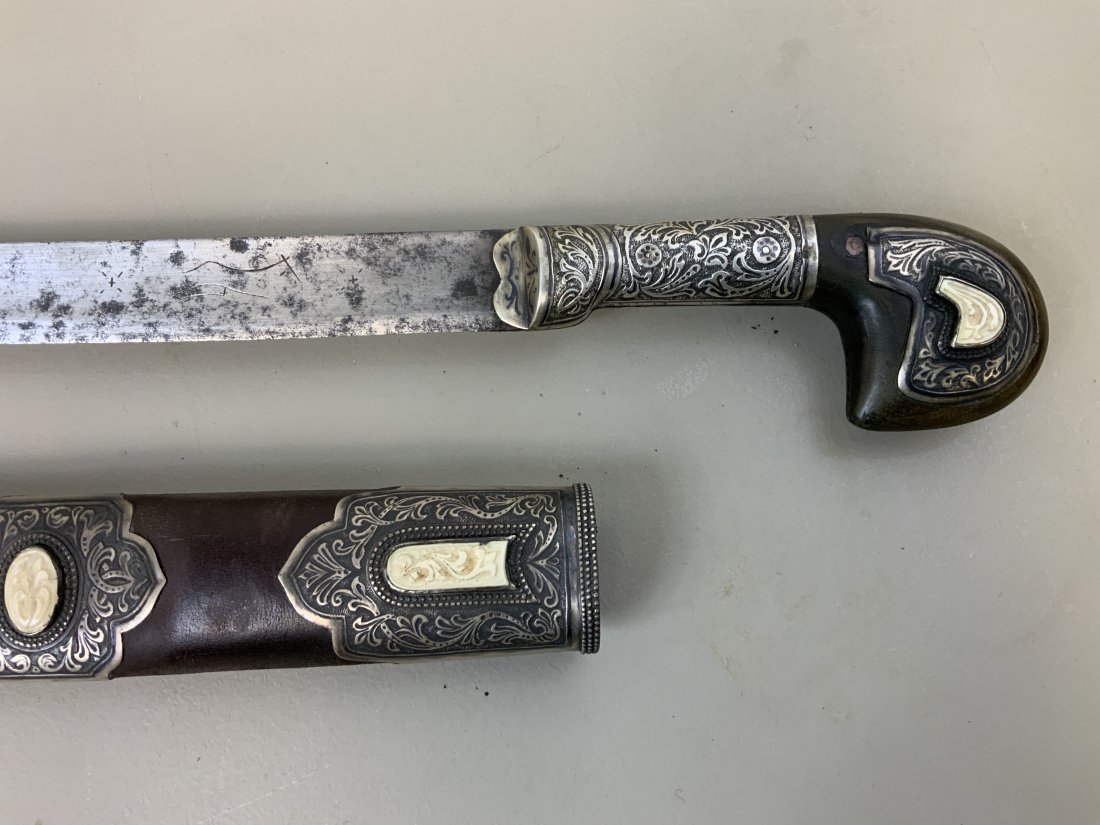 ANTIQUE RUSSIAN COSSACK CAUCASIAN SHASHKA SWORD SILVER: ANTIQUE RUSSIAN COSSACK CAUCASIAN SHASHKA SWORD . SILVER NIELLO WITH BONE INLAYS DECORATED FITTINGS. ANTIQUE CAUCASIAN MADE BLADE WITH CHARACTERISTIC MARKS. BEAUTIFUL DECORATED GRIP. 84 SILVER STAMPED