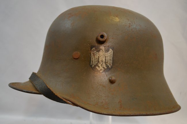 WWII GERMAN TRANSITIONAL DD HELMET M16 AUSTRIAN WWI: WWII GERMAN TRANSITIONAL DD HELMET . ORIGINALLY M16 AUSTRIAN WWI MADE 66 SIZE HELMET . IT RETAINS ORIGINAL WWI PERIOD AUSTRIAN LINER . DOUBLE DECAL ARE PERFECT . 1930'S CHIN STRAP . OVERALL THIS HELME