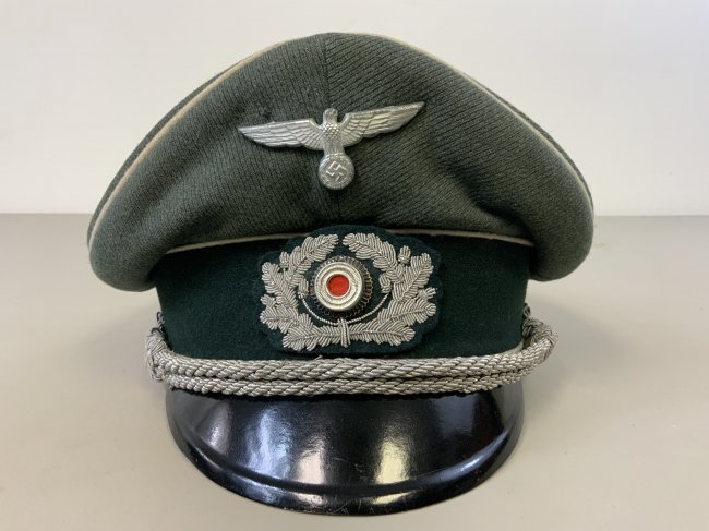 WWII GERMAN ARMY INFANTRY OFFICERS VISOR HAT CAP: WWII GERMAN ARMY INFANTRY OFFICERS VISOR HAT CAP . VERY NICE EXAMPLE WITH EXCELLENT SADDLE SHAPE. MANY STAMPS INSIDE . SIZE ABOUT 57 .