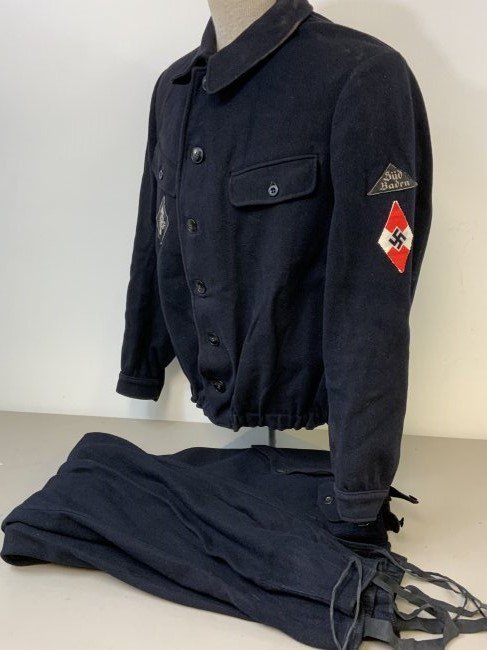 NAZI GERMAN HITLER YOUTH HJ BLUE WOOL UNIFORM JACKET: NAZI GERMAN HITLER YOUTH HJ BLUE WOOL UNIFORM JACKET AND PANTS. VERY GOOD CONDITION . ALL INSIGNIAS ARE INTACT. RARE .